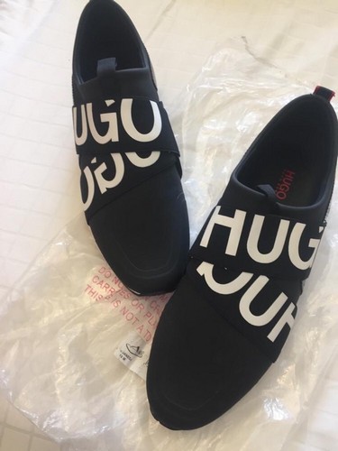 Hugo Boss slip-on trainers with logo. Item is never worn.